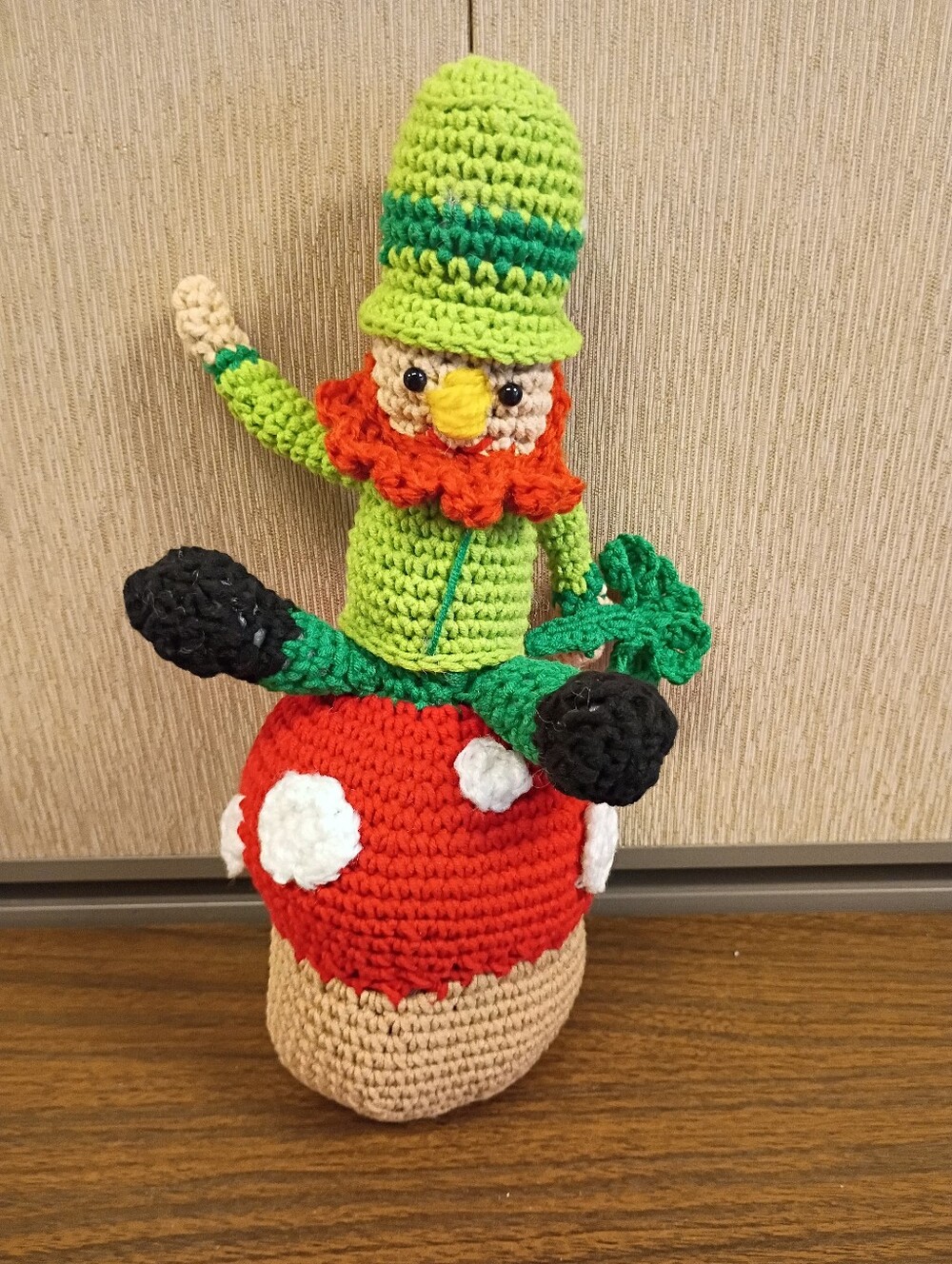 Crochet Leprechaun sitting on Mushroom